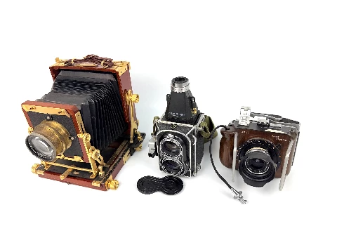 Father's camera collection — Tachihara large-format, modified Mamiya C twin-lens, and a handbuilt camera with Schneider-Kreuznach lens (Photo 1-15)