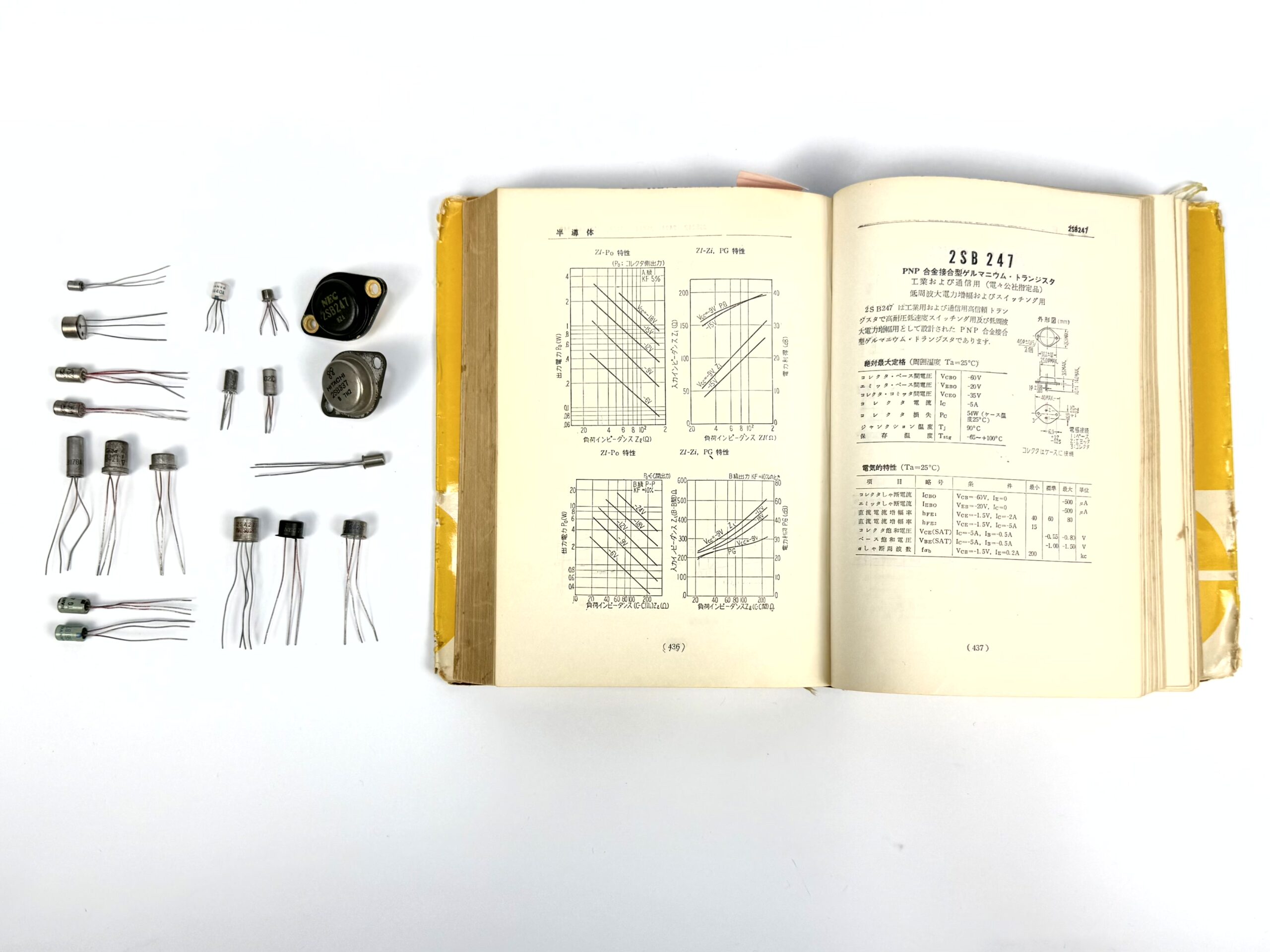 A 1964-1965 NEC Electronics databook alongside various germanium transistors from the author's collection